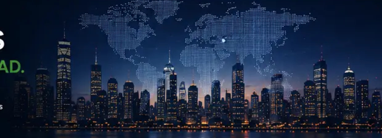 Global financial district skyline at dusk